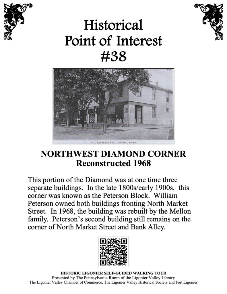 This portion of the Diamond was at one time three separate buildings. In the late 1800s/early 1900s, this corner was known as the Peterson Block. William Peterson owned both buildings fronting North Market Street. In 1968, the building was rebuilt by the Mellon family. Peterson’s second building still remains on the corner of North Market Street and Bank Alley.